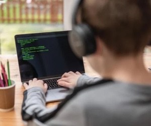 How can coding improve school performance?